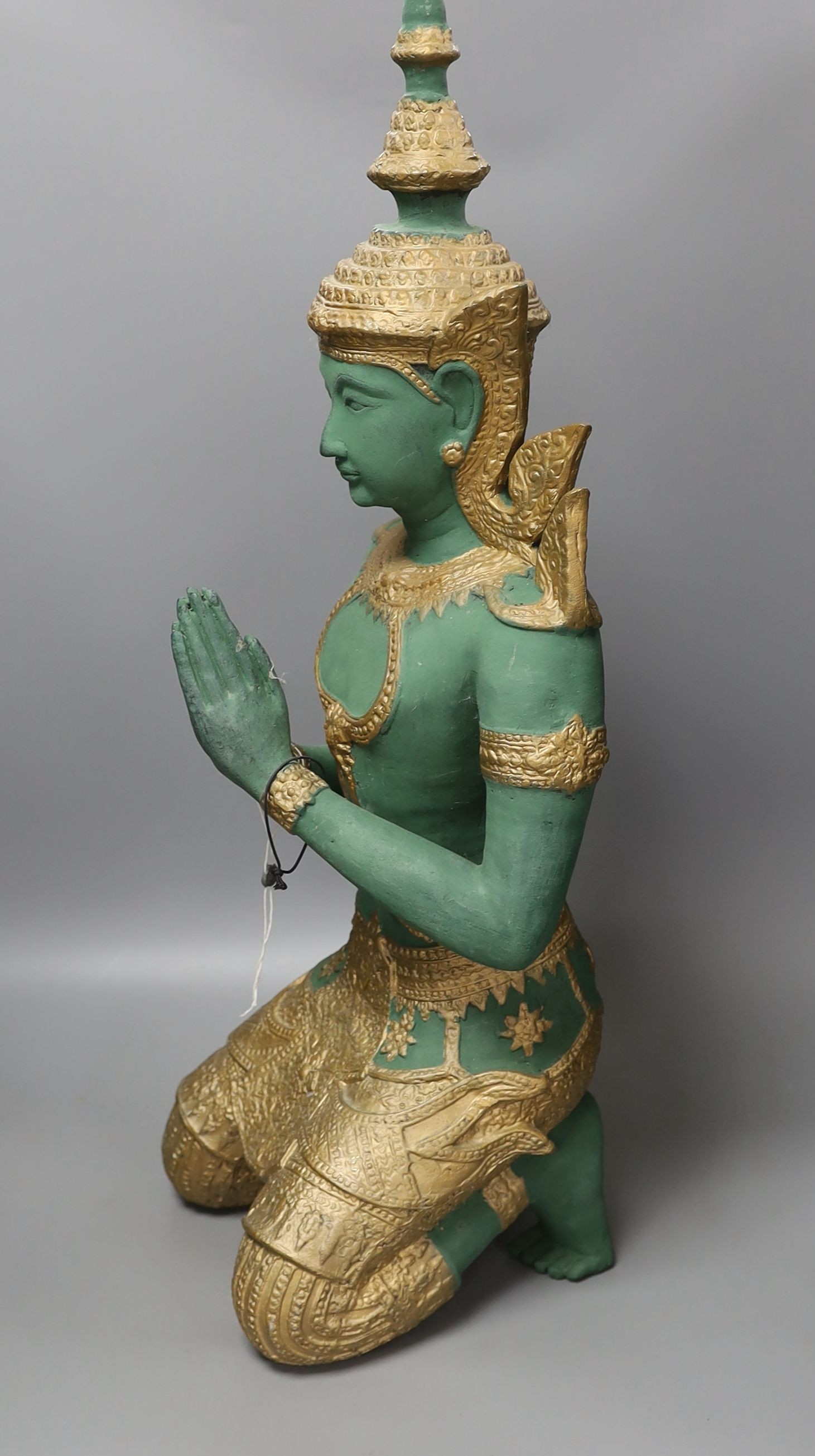 A Thai painted alloy of a kneeling Buddha - 69cm tall